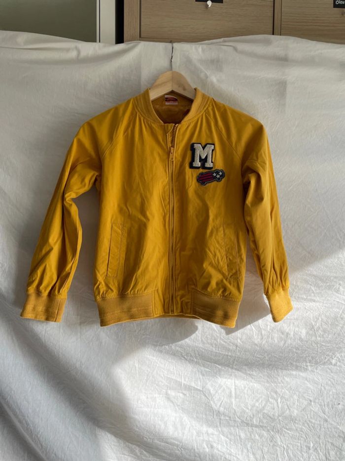 Veste 10 ans tape à l’œil