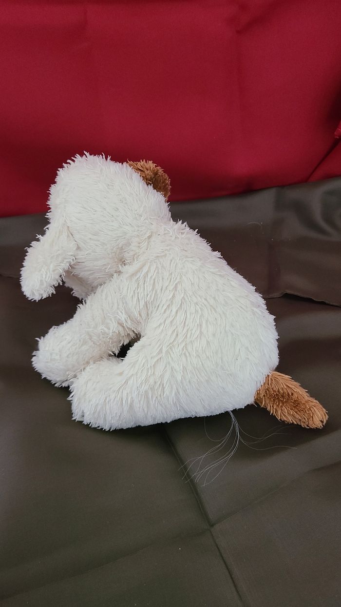 Peluche chiot crème yeux marron, taches et oreilles, souple assis - photo numéro 2