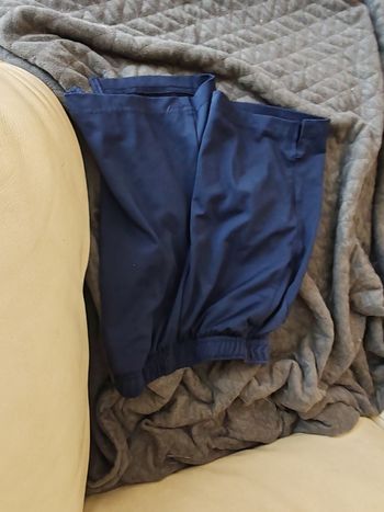Short de sport Decathlon 6 ans 116 cm.