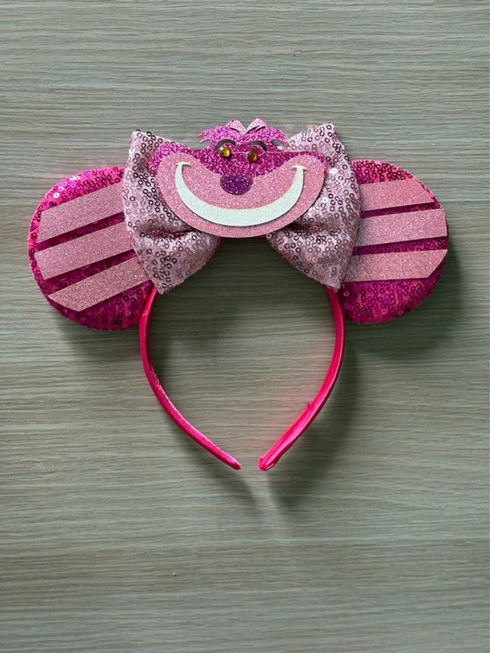 Serre-tête Disney rose à paillettes – Chat du Cheshire (Alice au Pays des Merveilles)