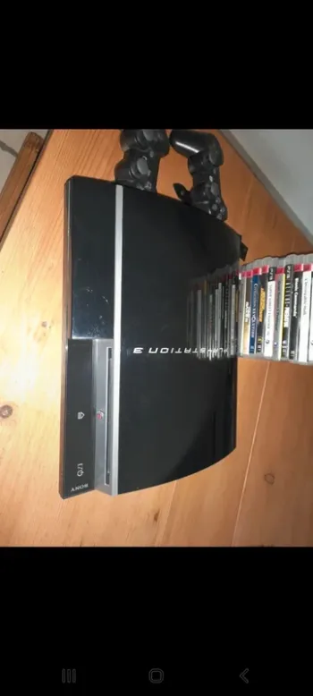 PlayStation 3 et ses 2 manettes