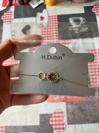 Très joli bracelet doré en acier inoxydable H.Dubin