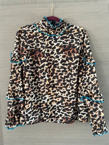Superbe blouse léopard taille 40