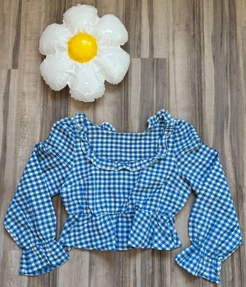 Blouse coûte à carreaux