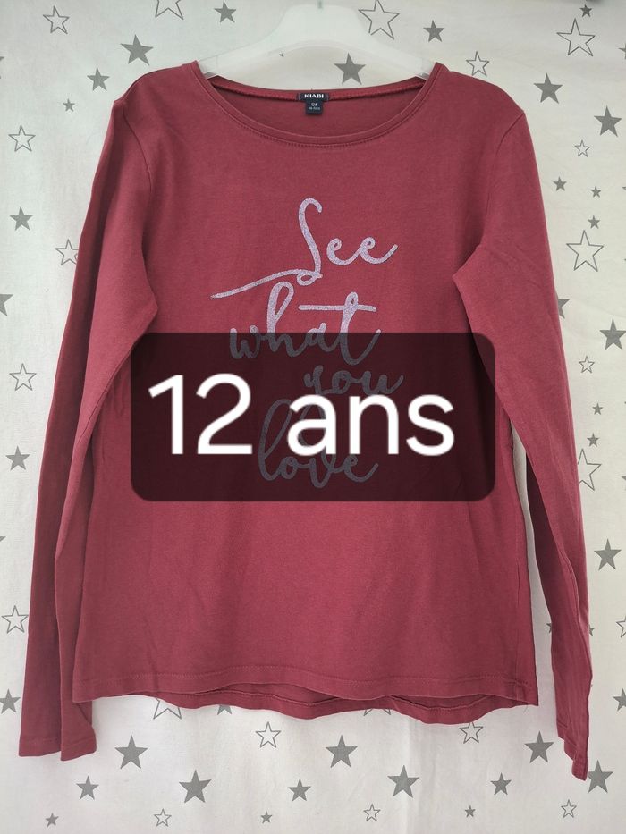 Tee-shirt manches longues bordeaux 12 ans Kiabi
Très bon état ni trous ni tache