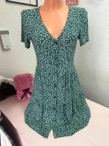 Robe fleurie à boutons H&M taille 34