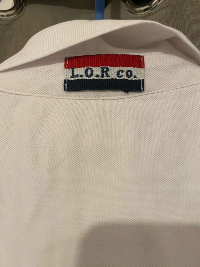 Polo à manches courtes blanc motifs écriture devant bleu marine neuf Lord of Rugby taille XXL - photo numéro 5