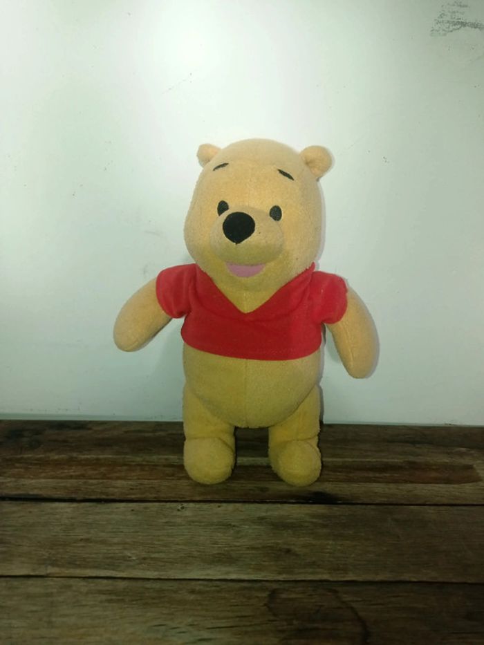 Winnie l'ourson hochet