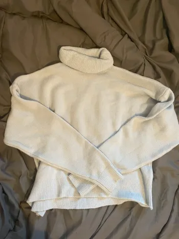 Pull col roulée