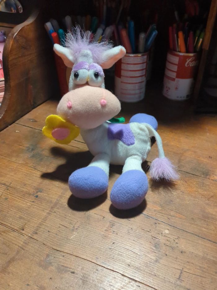 Peluche vache violette fleur