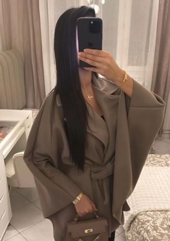 Veste à ceinture élégante 