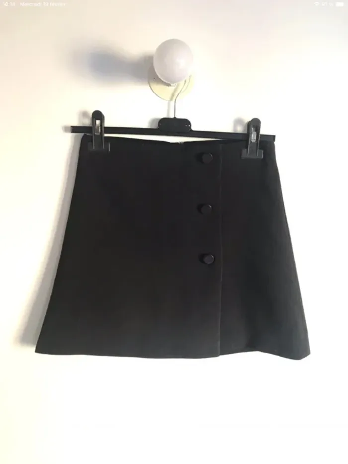 Mini jupe noire Oodji taille 34