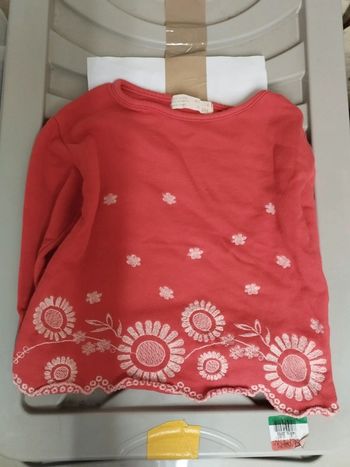 Pull rouge fleurie blanc 4ans