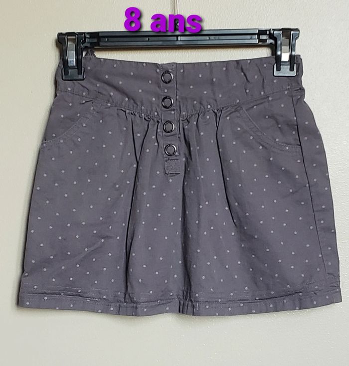 Jupe grise motifs blancs taille 8 ans