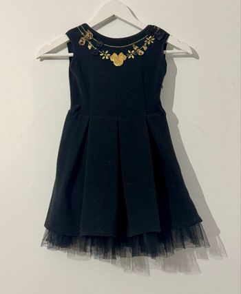 La petite robe noire dé Disneyland Paris 6 ans