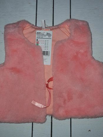 Gilet fourrure 23 mois neuf