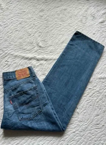 Jean Levi’s femme 550 Relaxed Fit W27 L27 S/36 bleu large ample mi taille - taille haute