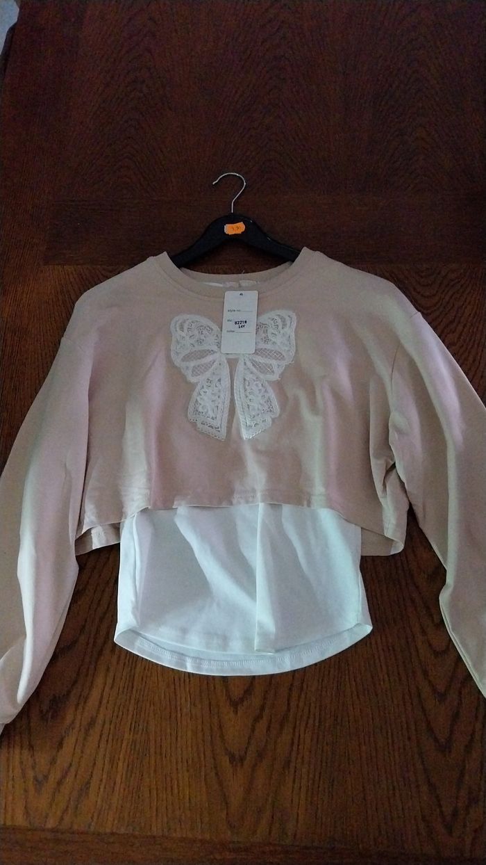 Pull 14ans