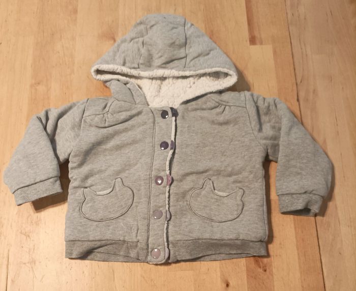 Veste fourrée à capuche