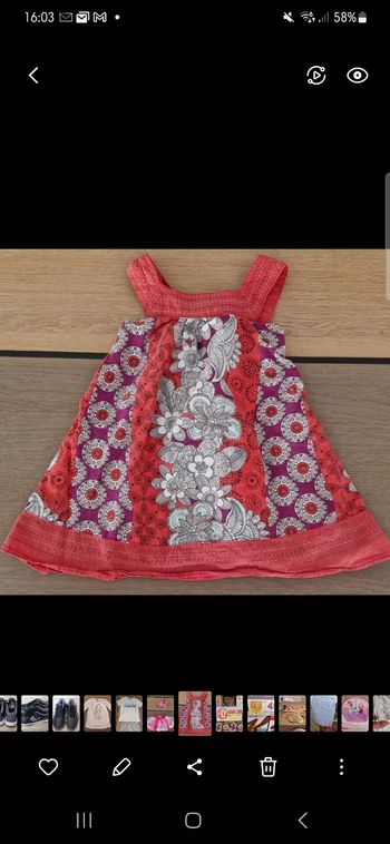 Tunique orchestra motif fleurs 8 ans en bon état