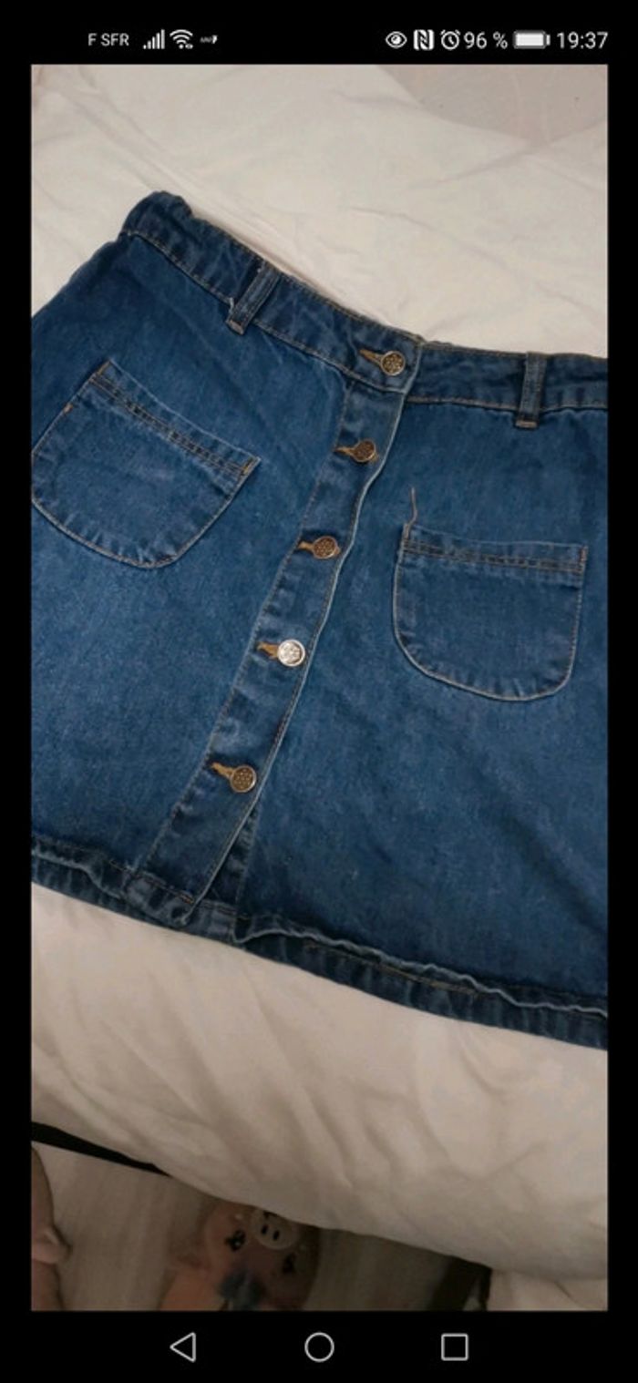 Très belle jupe en jean taille 16 ans