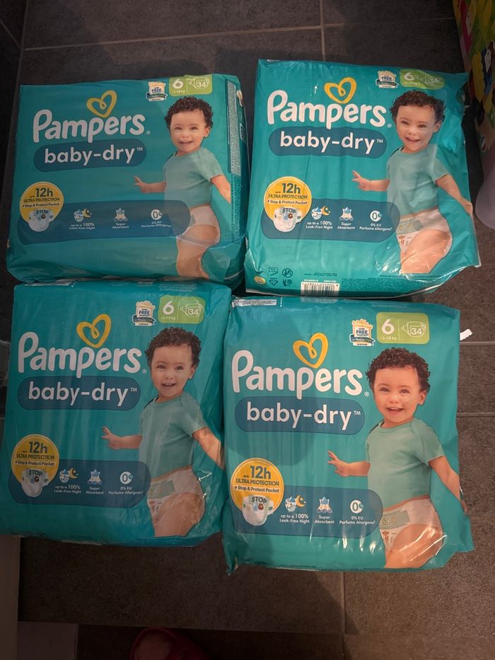 Lots couche Pampers taille 6