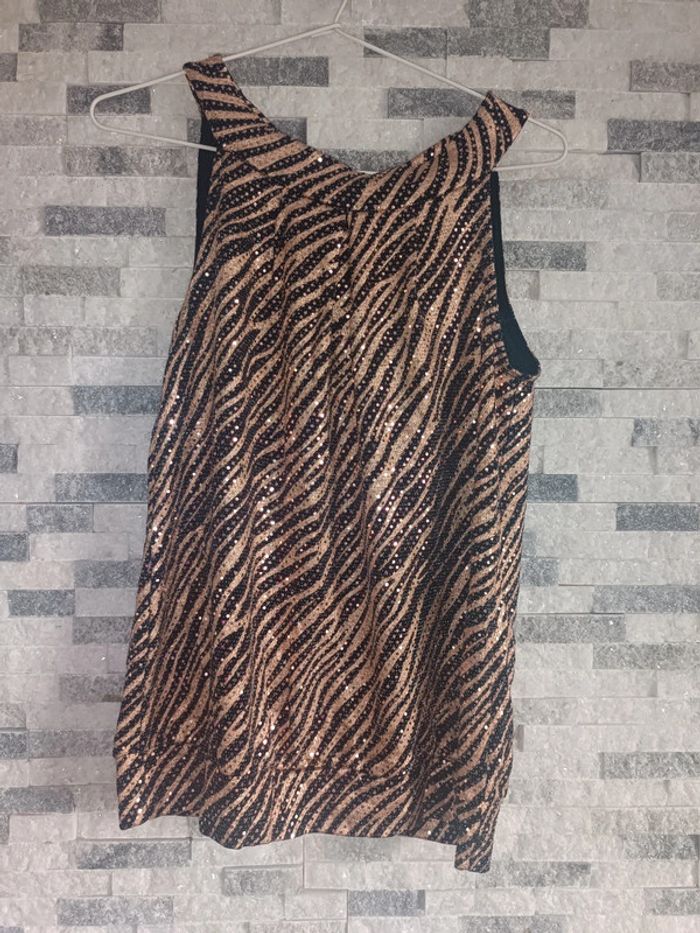 Haut à paillettes taille unique