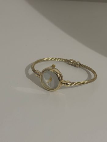 Montre dorée femme • Ajustable • Style chic minimaliste