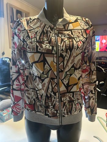 Veste légère pour femme très bon état taille M couleur multicolore