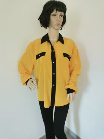Chemise jaune et noir. Taille 46.