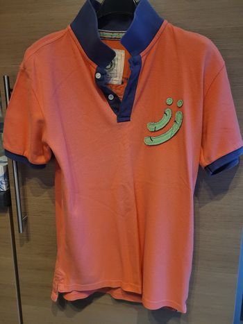 Polo rose orangé Taille 14 ans