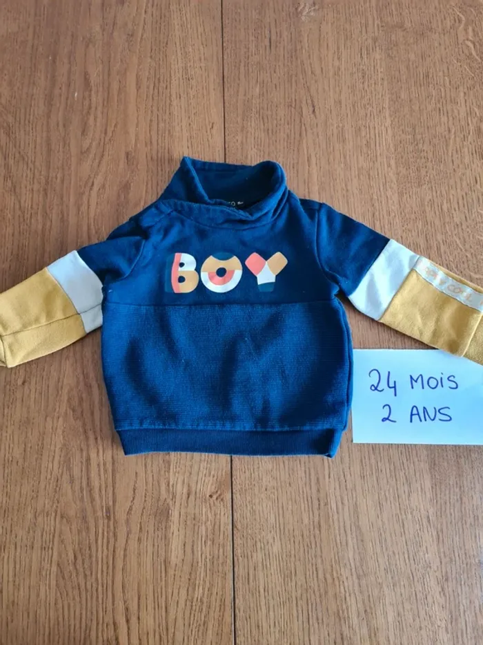 Pull col roulé