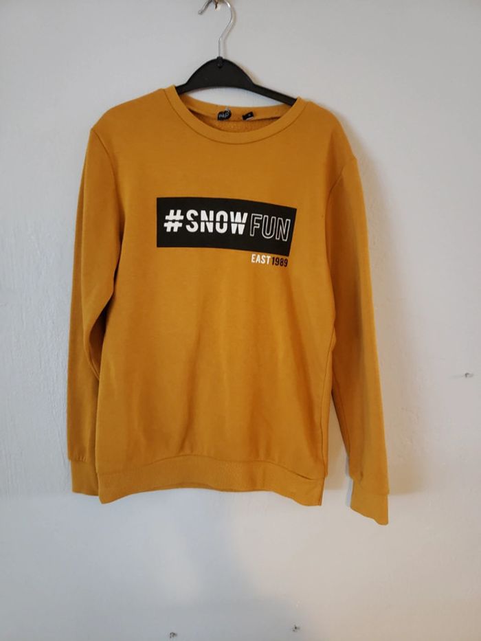 Pull jaune moutardes 12 ans