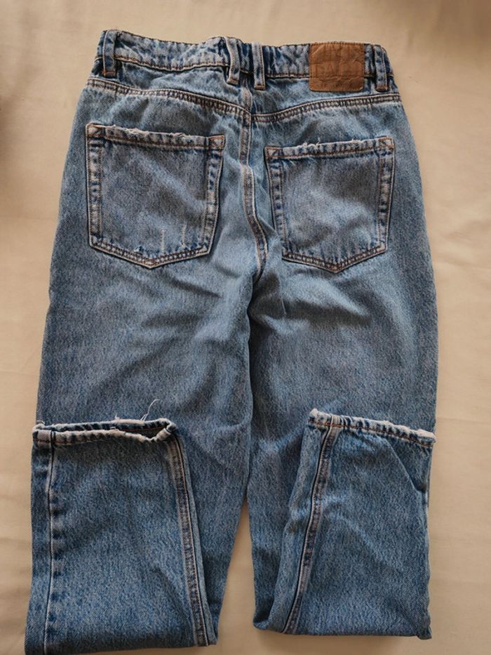 Jean troué, taille 34, marque Stradivarius, très bon état - photo numéro 9