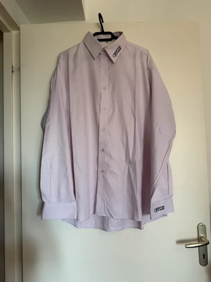 Chemise rose en très bon état taille XL comptoir du rugby