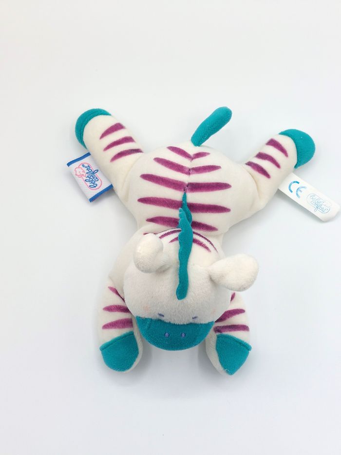 Petite peluche doudou zèbre blanc bleu mauve BEBE CONFORT grelot HS 18 cm aimant - photo numéro 2