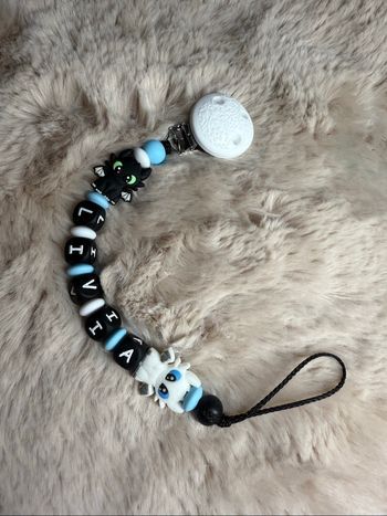 Attache tétine dragon