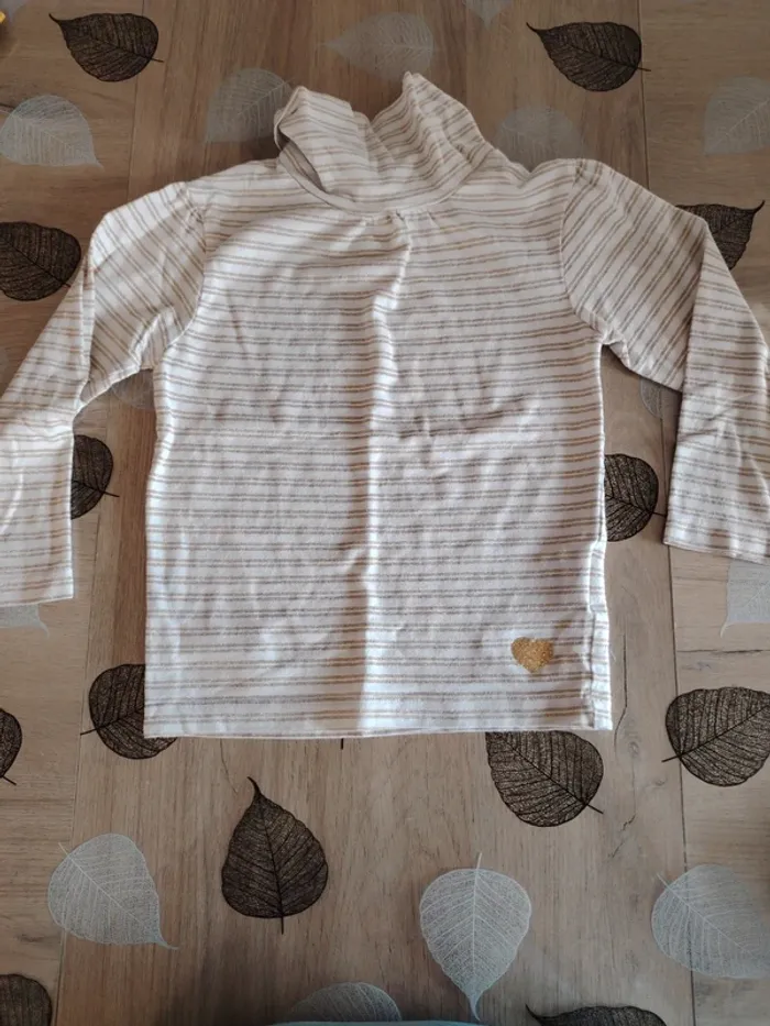 Pull col roulé