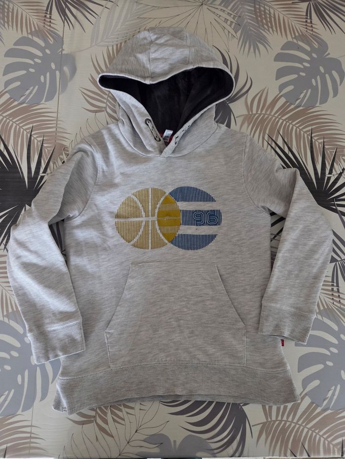 Pull capuche gris dessin ballon