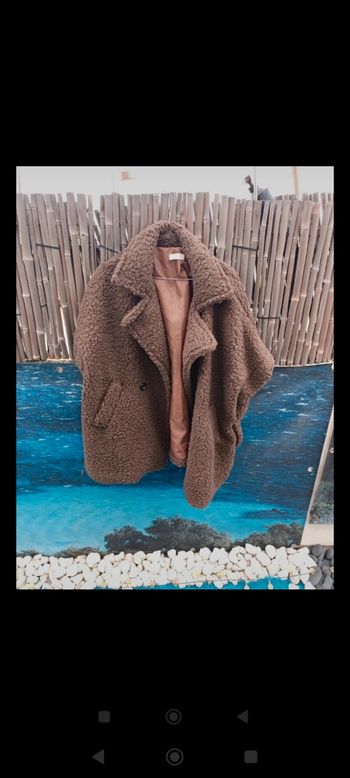 Manteau sans manche