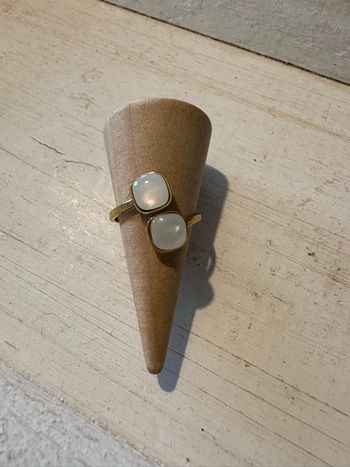 Bague dorée et blanche