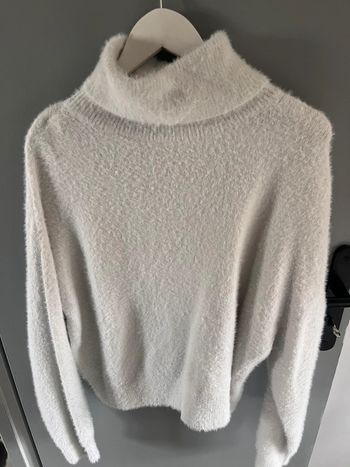 Pull col roulé