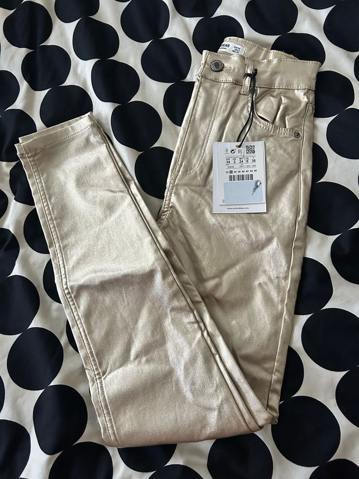 Pantalon huilé