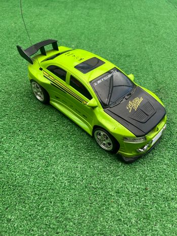 Voiture télécommandée Mitsubishi Turbo Tuners – 28 cm (aileron abîmé, télécommande absente)