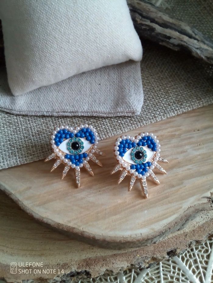 Boucles d'oreilles coeur oeil soleil
