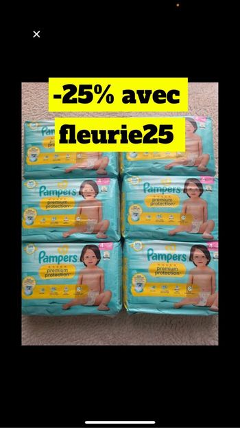 Six paquets de couches Pampers taille 4