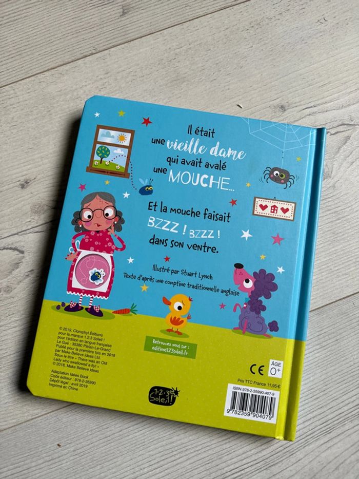 Livre il était une vielle dame qui avait avalé une mouche - photo numéro 4
