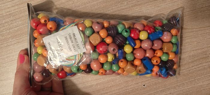 Sachet perles en bois neuf - photo numéro 2
