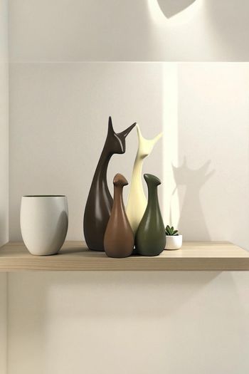 Lot de 4 statuettes décoratives cerfs en résine - Neuves