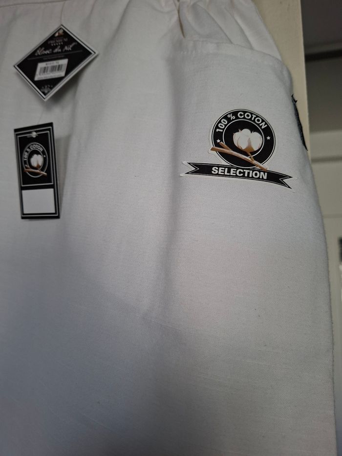 Vend jupe mi saison blanche taille 2 - photo numéro 2